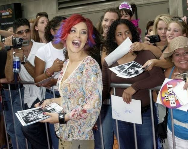 FILE PHOTO: Nikki McKibbin, the third runner-up on the television reality show "American Idol," poses as she arrives at the Kodak Theatre in Hollywood September 4, 2002 for the show's final. REUTERS/Jim Ruymen